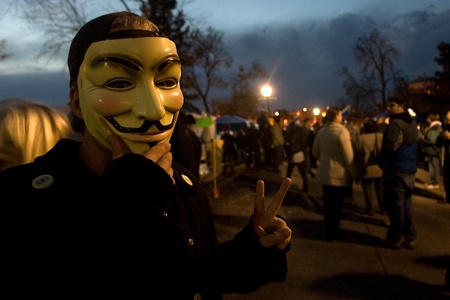 London Ontario, Canada - November 8, 2011. The Occupy London encampment in Victoria Park woke to notices posted around their camp to vacate the park by 6pm.  As 6pm passed the protestors and supporters celebrated that the police had not arrived.のeditorial素材