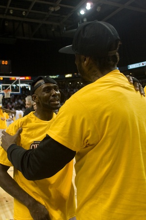 London Ontario, Canada - March 25, 2012. DeAnthony Bowden, left and Gabe Freeman celebrate after winning the league championship. のeditorial素材