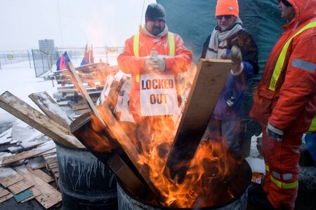 London Ontario, Canada - January 2, 2012. Locked out Canadian Auto Worker union members gather...
