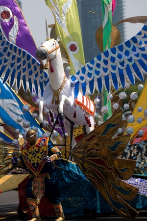 Toronto Ontario, Canada - August 4, 2012. The 47th annual Toronto Caribbean Carnival parade made its way down Lakeshore Avenue on a very hot August day. Formerly known as Caribbana, masqueraders in feather and sequined costumes entertained the crowd who lのeditorial素材