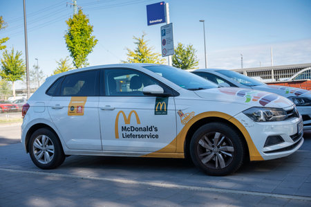 Germany , Cottbus , 08/24/2023 , Car from McDonalds delivery serviceのeditorial素材