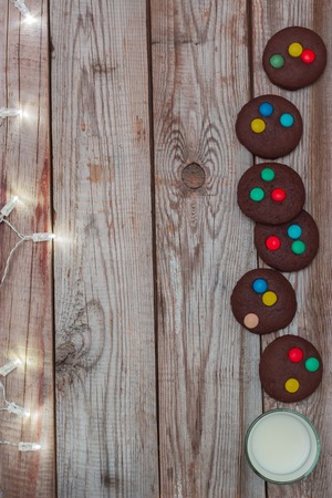 Cookies and garland on wooden background.の写真素材