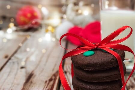 Christmas composition with garland on wooden background.の写真素材