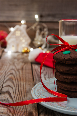 Christmas composition with garland on wooden background.の写真素材