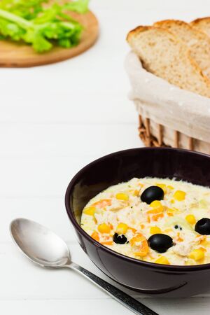 Lunch or dinner creamy chicken soup on a white background.の写真素材