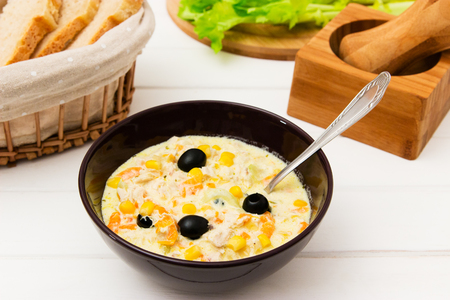 Lunch or dinner creamy chicken soup on a white background.の写真素材