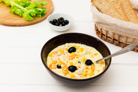 Lunch or dinner creamy chicken soup on a white background.の写真素材