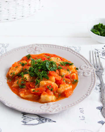 Eggless lenten potato gnocci tomato garlic sauceの写真素材
