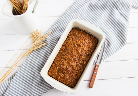 Vegan lenten carrot cake striped tablecloth white backgroundの写真素材