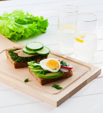 Healthy food concept - sandwiches with chicken and vegetables.の写真素材