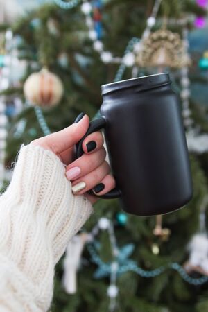 Beautiful christmas nail design sweater hand selective focus.の写真素材
