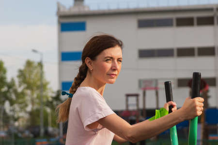 Young skinny woman rehabilitation outdoor selective focusの写真素材