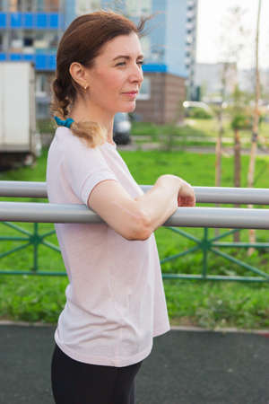 Young skinny woman rehabilitation outdoor selective focusの写真素材