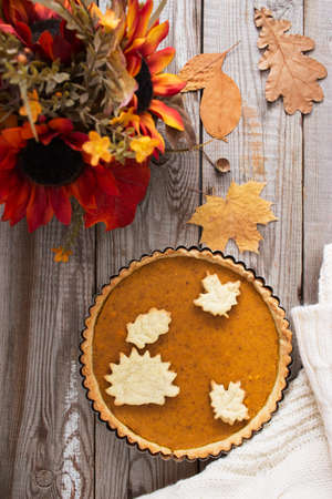Autumn fall pumpkin pie knit blanket background.の写真素材
