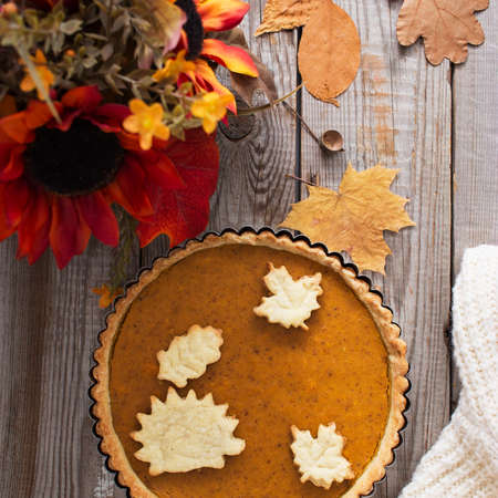 Autumn fall pumpkin pie knit blanket background.の写真素材