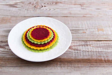 Russian crepes saucer on Maslenitsa wooden background .の写真素材