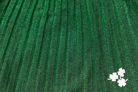 paper clover st. Patrick's day on green luster background.の写真素材