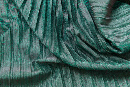 Green blue luster festive pleated backgroundの写真素材