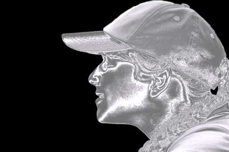 Silver covered girl metal profile black backgroundの写真素材