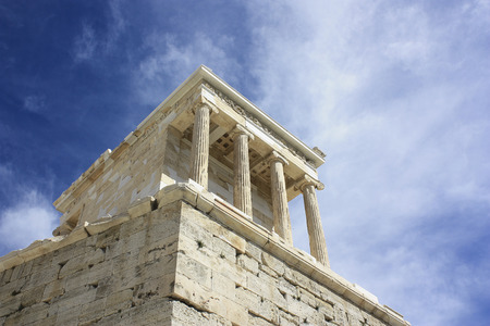 View on Temple of Athena Nike Athens in Acropolis with blue sky and clouds on the background. Athene, Greece - 20.04.2016.のeditorial素材