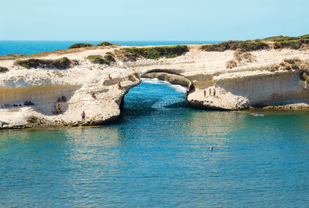 Rock arch S'Archittu di Santa Caterina in Sardinia, Italy.の写真素材