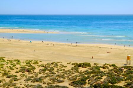 Aerial view on the beach Playa de Sotavento with unknown people. Fuerteventura, Spain - 16.02.2017.のeditorial素材