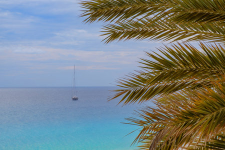 Beautiful landscape with sailboat in the ocean on the Canary Island Fuerteventura, Spain.