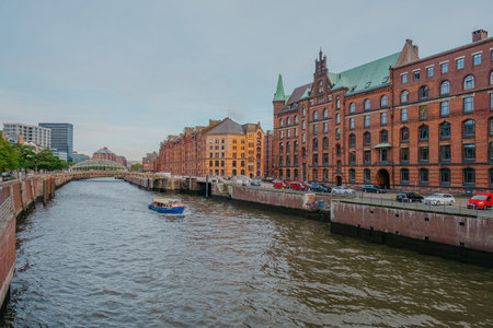 Hamburg, Germany - October 25, 2023: Speicherstadt buildings and boats on a canal in Kehrwieder in Hamburg.のeditorial素材