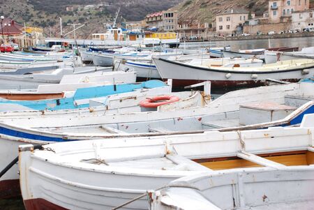 Boats berthed. waiting for good weatherの写真素材