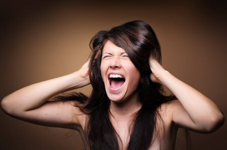 Portrait of a beautiful young charming girlの写真素材