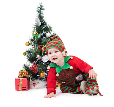 A baby dressed as a elf.  isolated.の写真素材