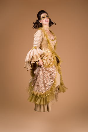 portrait of a young cute girl. Retro Holidays Celebration. Masquerade. Vintage Styledの写真素材