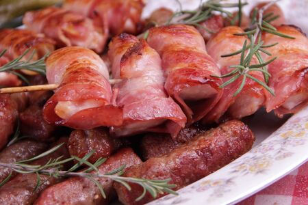 Chicken meat wrapped in baconの写真素材