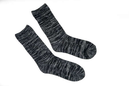 Pair of wool gray black socks isolated on white background with copy spaceの写真素材