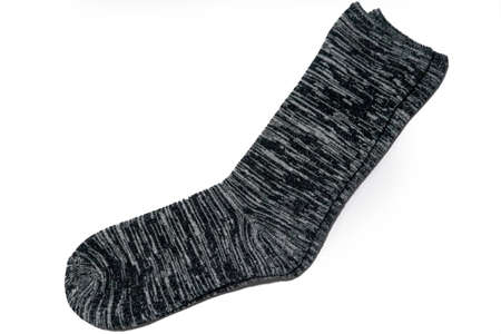 Pair of wool gray black socks isolated on white background with copy spaceの写真素材