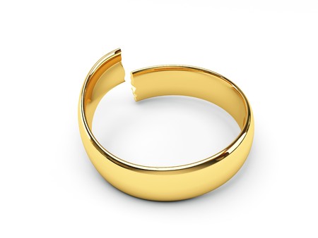 isolated broken gold wedding ringsの写真素材