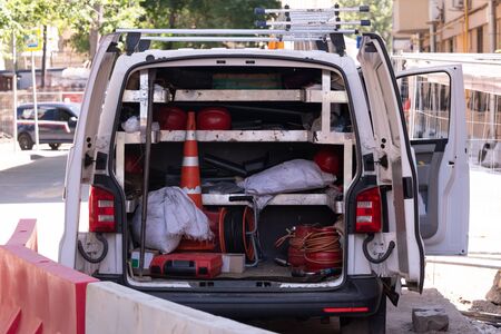 the car with the equipment for repair of city communications