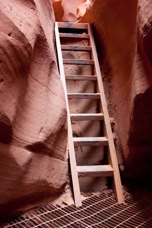 Stairs help get through Antelope Canyon which is the most-visited and most photographed slot canyon in the American Southwest located on Navajo land near Page, Arizona.の写真素材