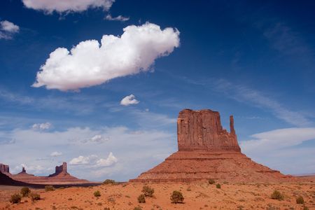 Monument Valley is considered one of the natural wonders of the world because of the beauty of the enormous "monuments" of stone that have evolved from nature.の写真素材