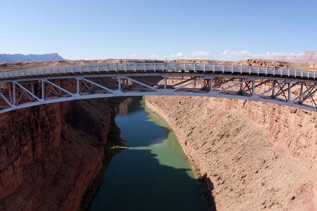 Navajo Bridge crosses the Colorado River's Marble Canyon near Lee's Ferry in the U.S. state of Arizona.の写真素材