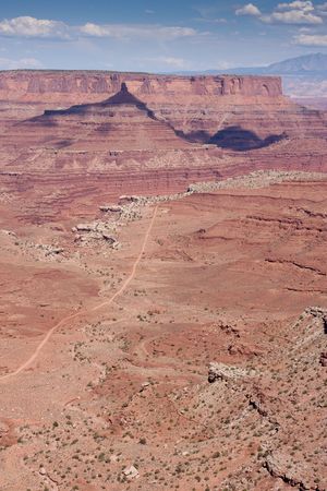 Canyonlands National Park is located near the city of Moab, Utah and preserves a colorful landscape eroded into countless canyons, mesas and buttes by the Colorado River, the Green River, and their respective tributaries.の写真素材