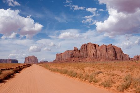 Monument Valley is considered one of the natural wonders of the world because of the beauty of the enormous "monuments" of stone that have evolved from nature.の写真素材