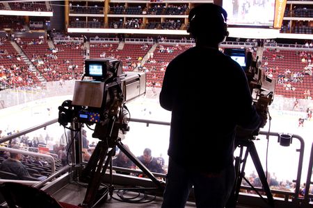 PHOENIX - APRIL 4: Cameras at NHL hockey game featuring the Phoenix Coyotes and Edmonton Oilers of the National Hockey League. April 4, 2010 in Phoenix, Arizona.のeditorial素材