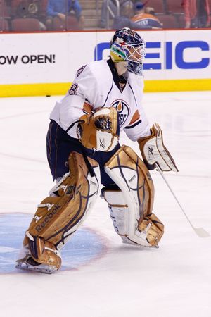 PHOENIX - APRIL 4: NHL goalie Devan Dubnyk of the Edmonton Oilers of the National Hockey League. April 4, 2010 in Phoenix, Arizona.のeditorial素材