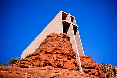 The Chapel of the Holy Cross is an iconic Catholic chapel built into the mesas of Sedona, Arizona.  It is built directly into a butte and offers a spectacular view of the valley below.の写真素材