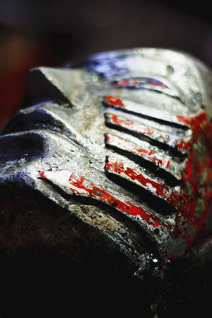 Silver metallic face of a statueの写真素材