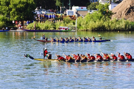 SASKATOON - JULY 24: Athletes fight hard for victory and had fun at the dragon boat racing festival...
