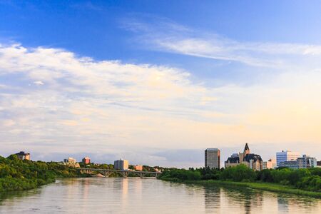 Saskatoon cityscape by the South Saskatchewan River.