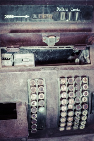 An old rusty antique cash registerの写真素材