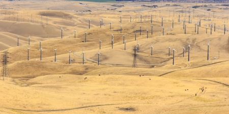 Wind turbine generators generating electric power through Patterson Pass in Californiaの写真素材